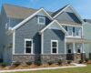 Siding house exterior depositphotos xl suburban roofing vinyl curb appeal material shakes boost ways top stone side blue residential green